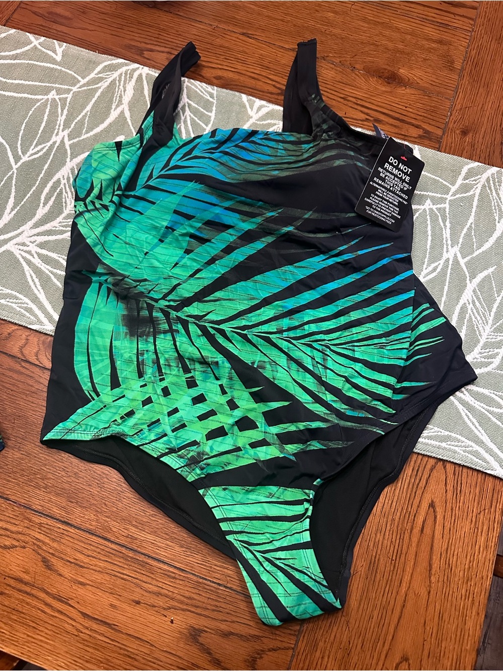 Swimsuits For All Black One-Piece Swimsuit with Green Palm Accent